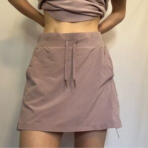 Light purple athletic/golf skirt with drawstring waist and built-in shorts